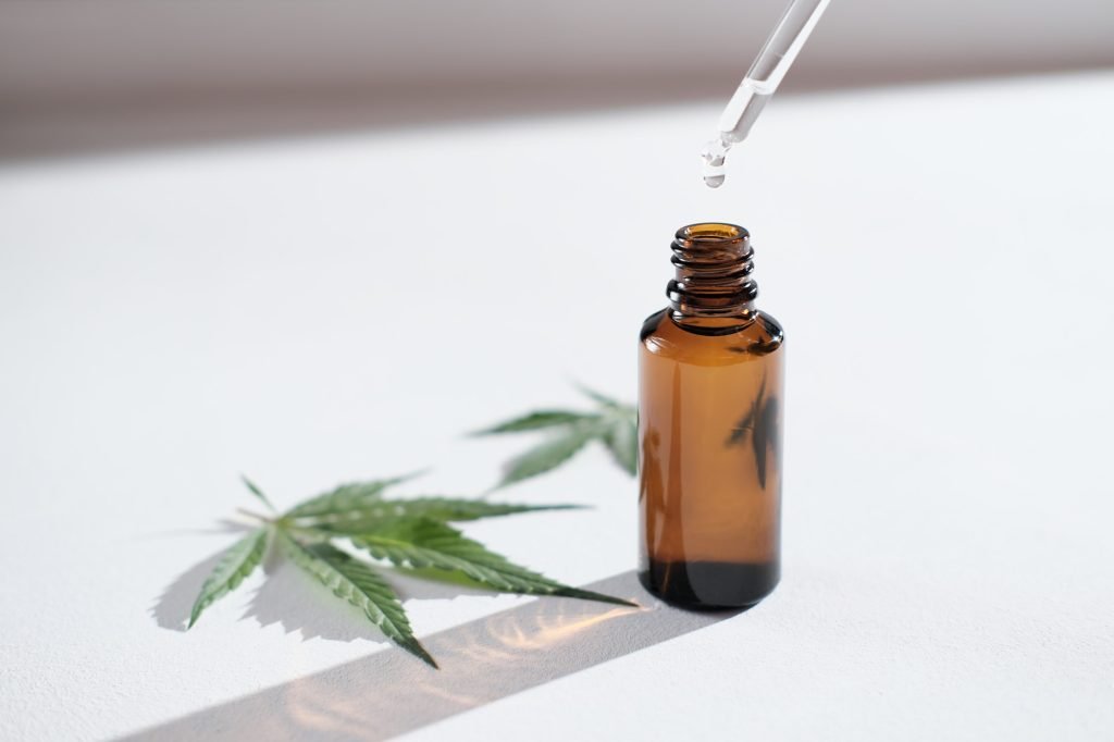 Medical Marijuana Cannabis Cbd Oil, THC tincture and hemp leaves, Herbal Treatment